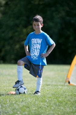 A Kid Playing Football